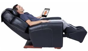 person sitting on recliner chair
